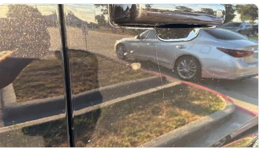 Passenger side front door with a ding detected by AI